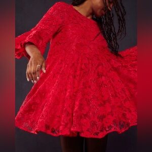 Very big for XS. Flowy bright red.